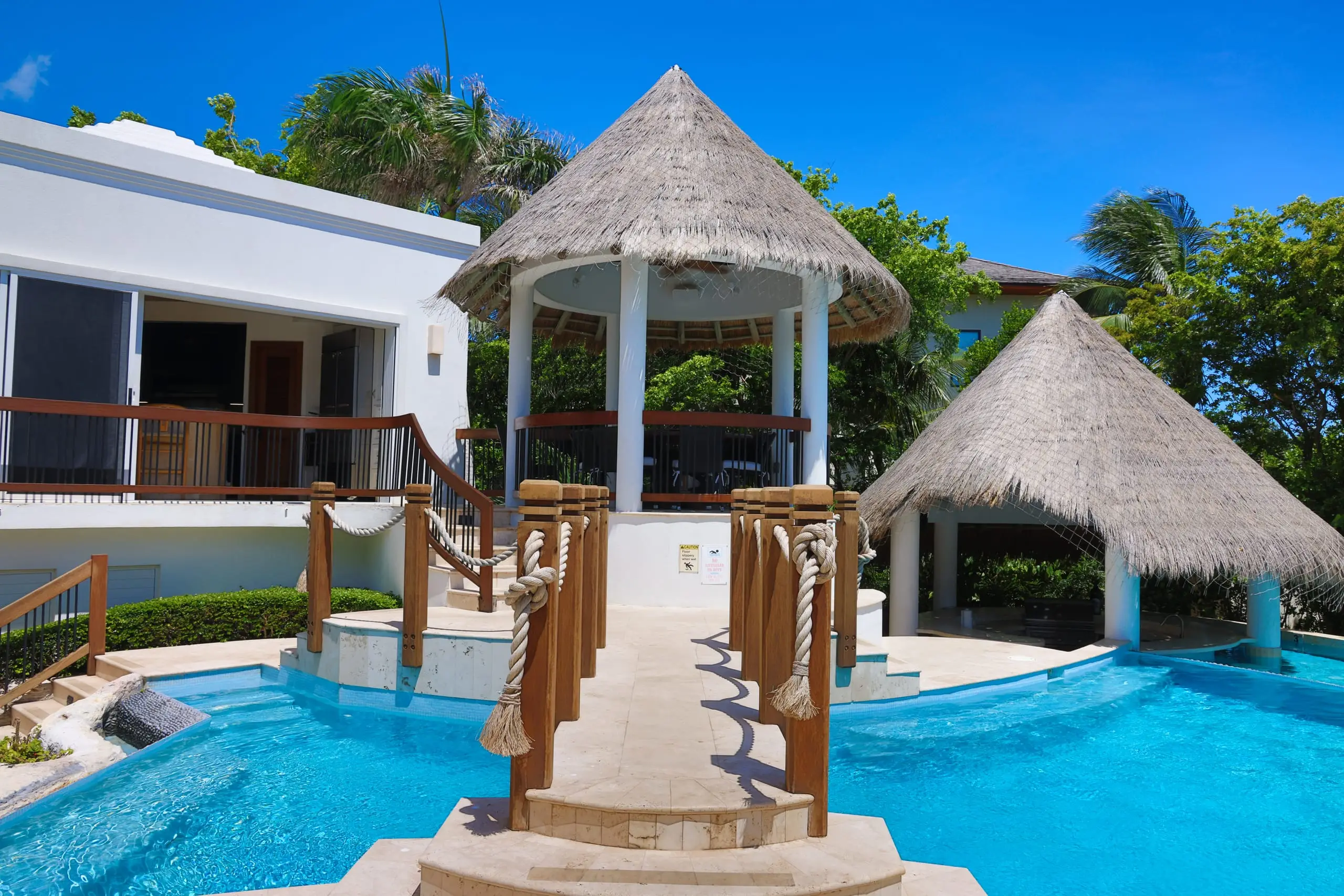 The bridge to the gazebo over the pool